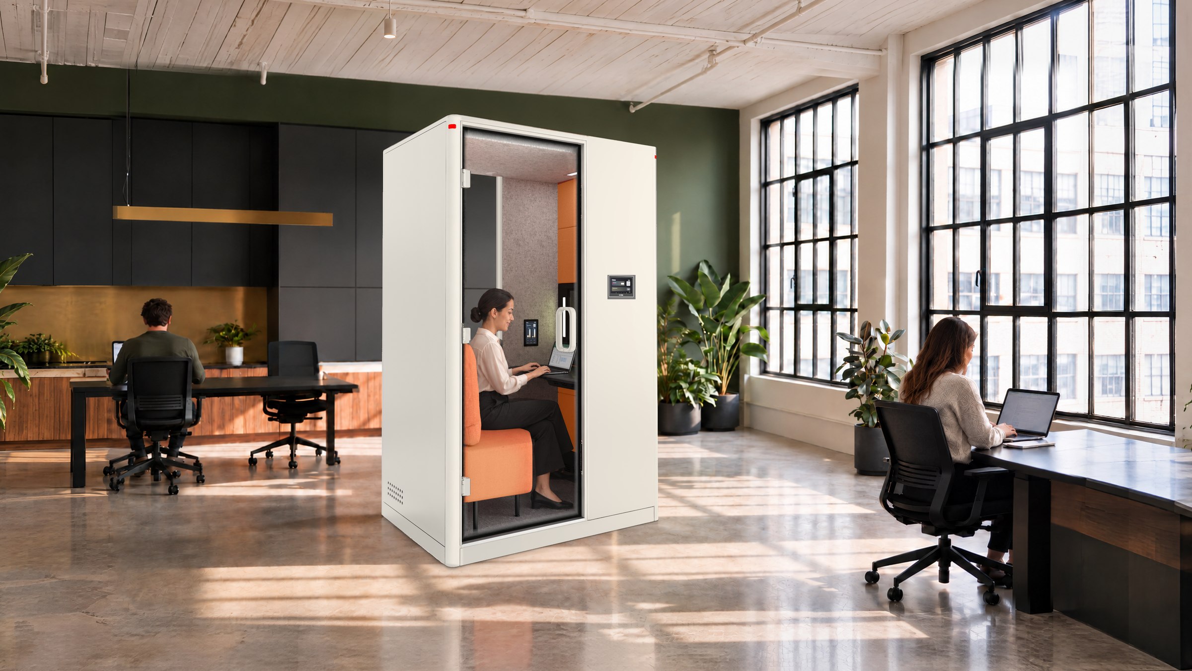 A Calma For U pod in a warm, wood-lined office, a person inside on a video call